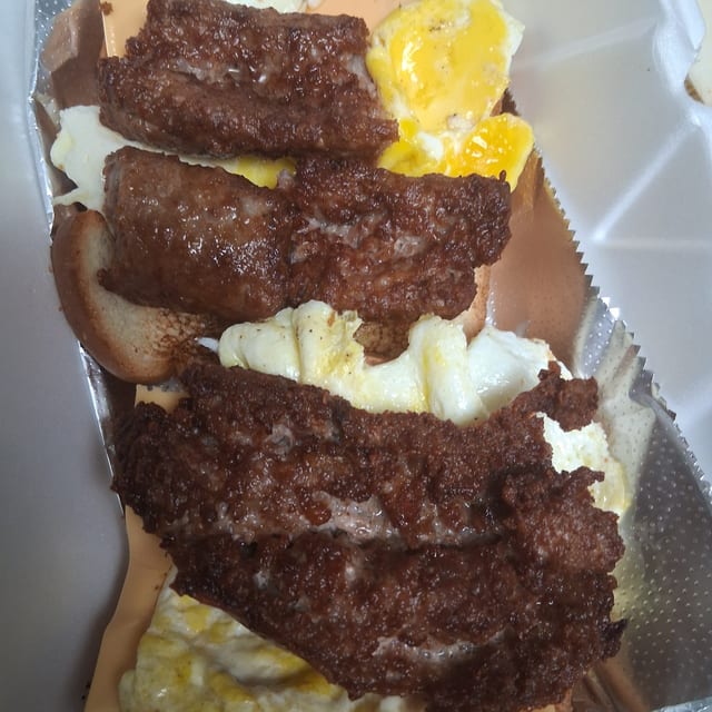 OnionsSausage, Egg, & Cheese Sandwich.